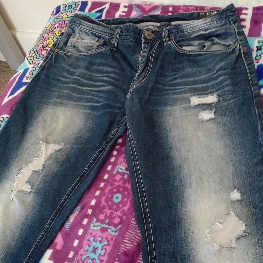 Buffalo jeans, ripped jeans.